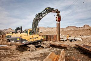 Gerber Construction Inc used a MG-90 Grizzly for a project consisting of rebuilding a new rip rap dam in Green River, Utah.
